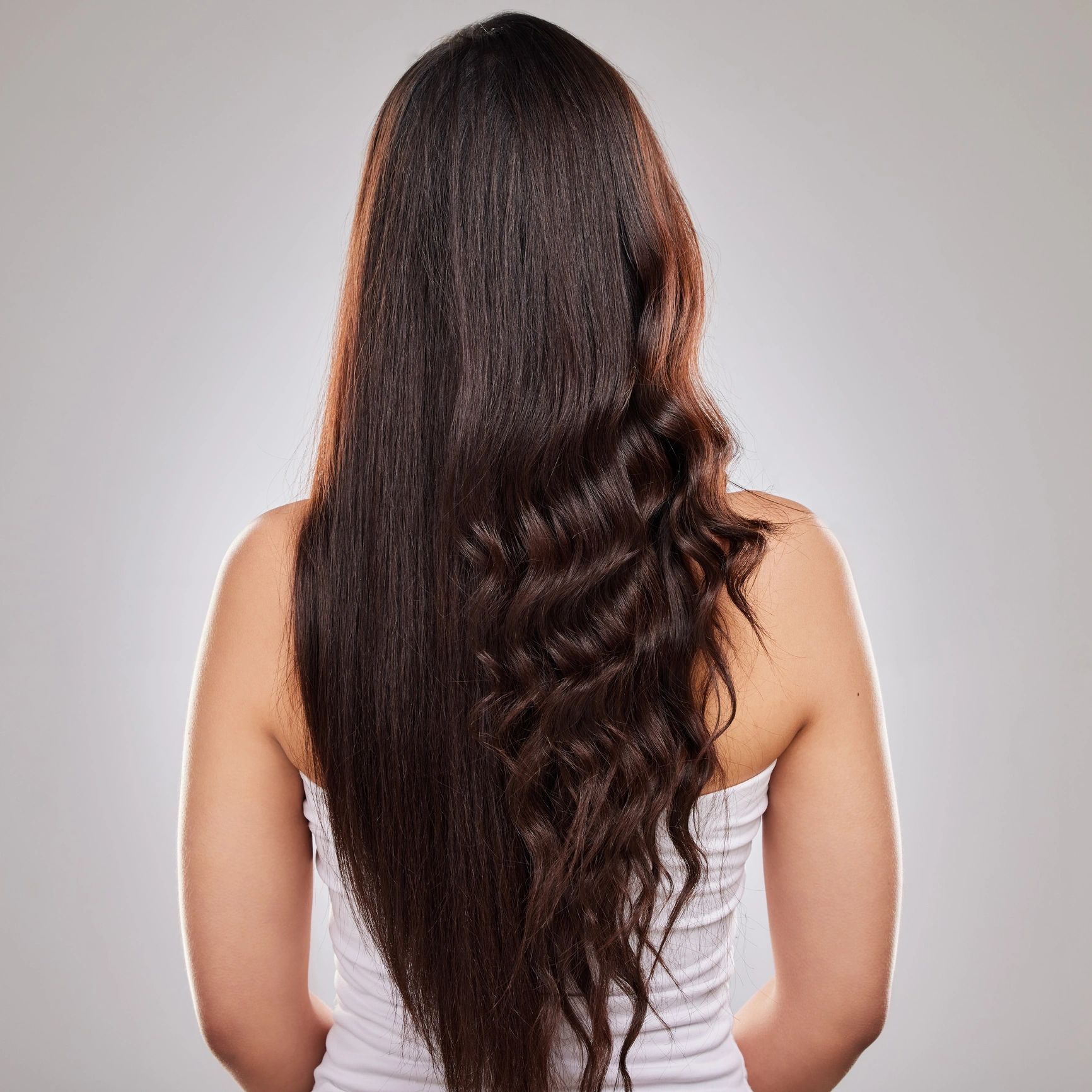 Styled hair showing straight and curled finish
